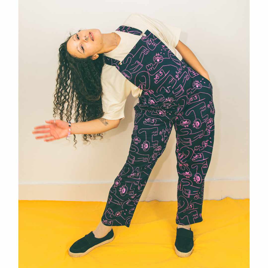 Genderless dungarees made in the UK in pink and navy blue