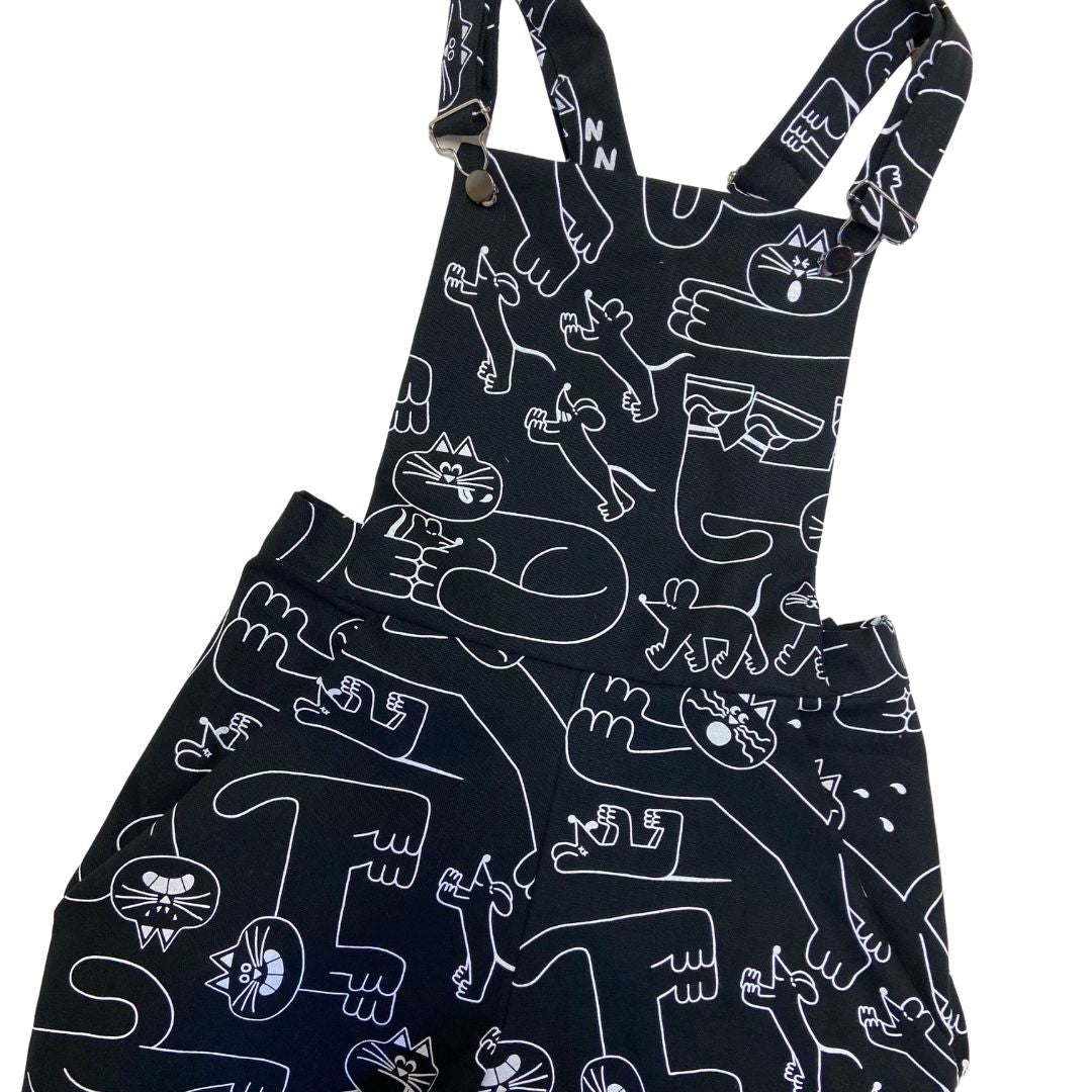 YUK FUN Dora dungarees in black and white made from 100% organic cotton