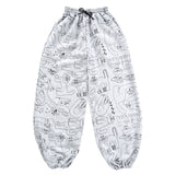 Baggy grey jogging bottoms with all over cat print designed and made by YUK FUN
