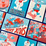 Collection of Christmas-themed cards with snowmen, Santa Claus, and winter scenes illustrated by YUK FUN