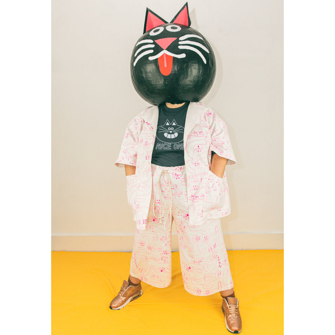 An awesome cat print trouser suit in white designed and ethically made in the UK by YUK FUN