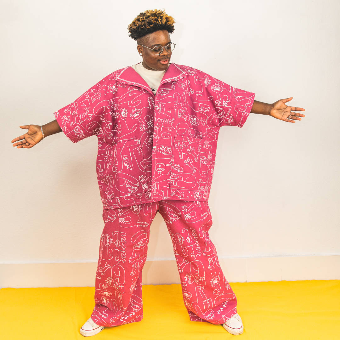The ultimate pink suit for cat lovers designed and ethically made in the UK with 100% organic cotton by YUK FUN
