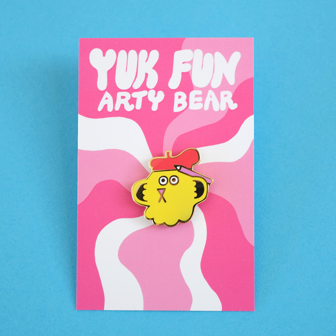 A cool artistic bear enamel pin for arty types by YUK FUN